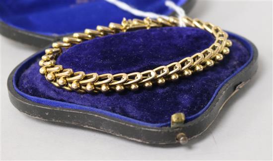 An Edwardian 15ct gold oval and sphere link bracelet in fitted box.